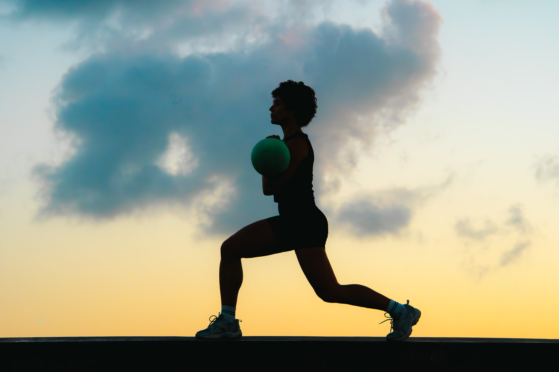 Laura Treto, sunset lunge silhouette