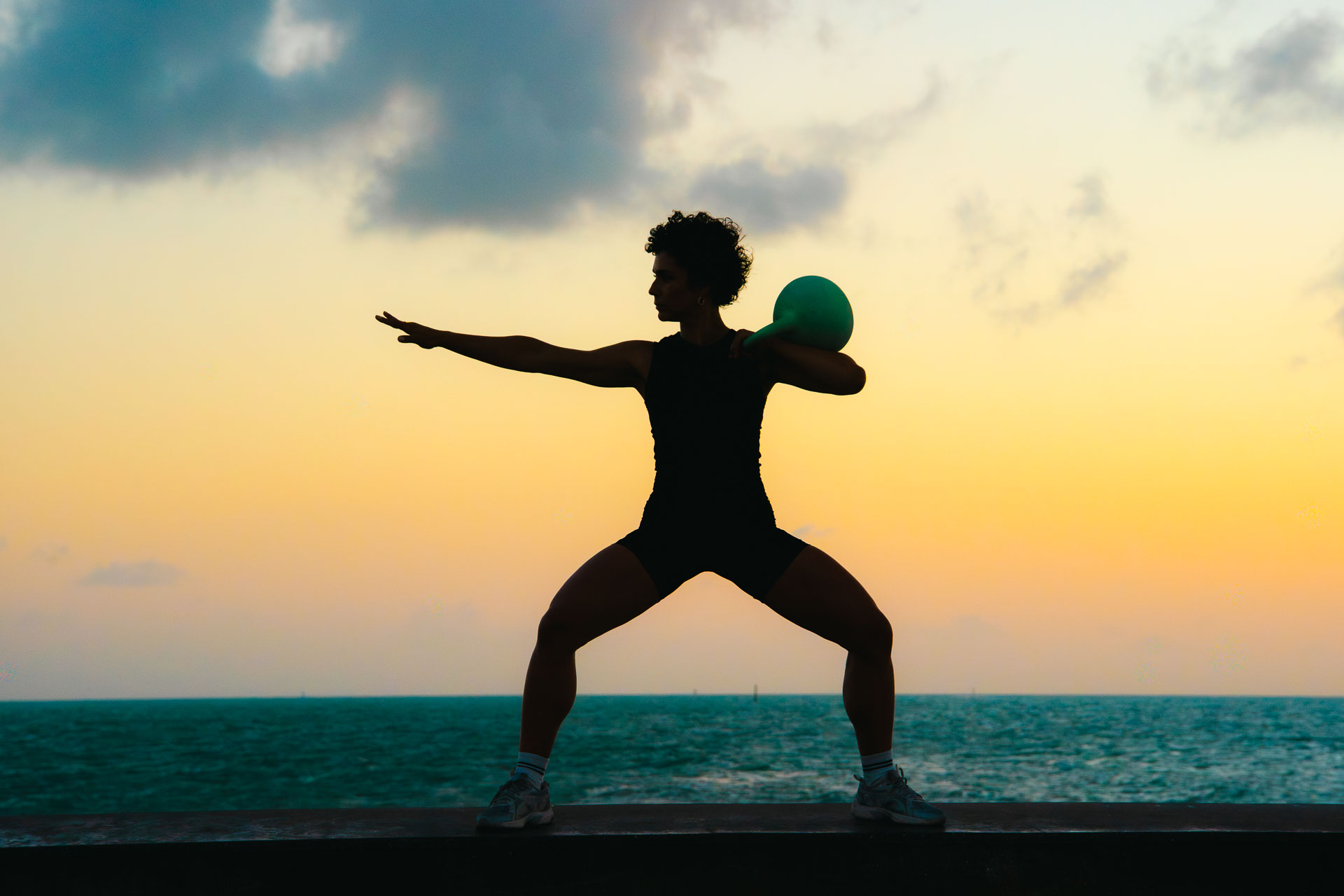 Laura Treto, sunset wide stance silhouette